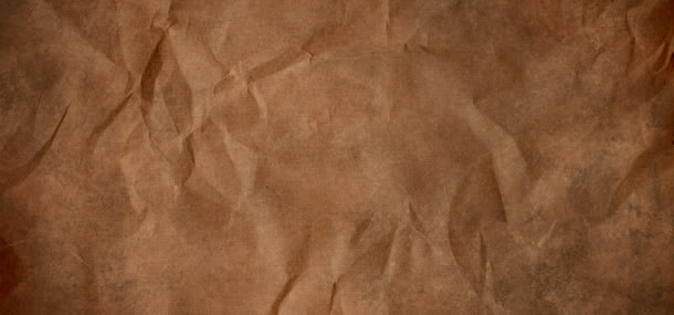 深棕色牛皮纸褶皱纹理背景
